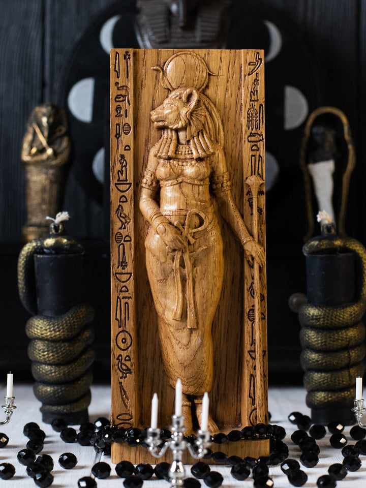 Full view of the Sekhmet statue from the front, highlighting its dimensions and intricate design featuring traditional Egyptian attire and symbols.