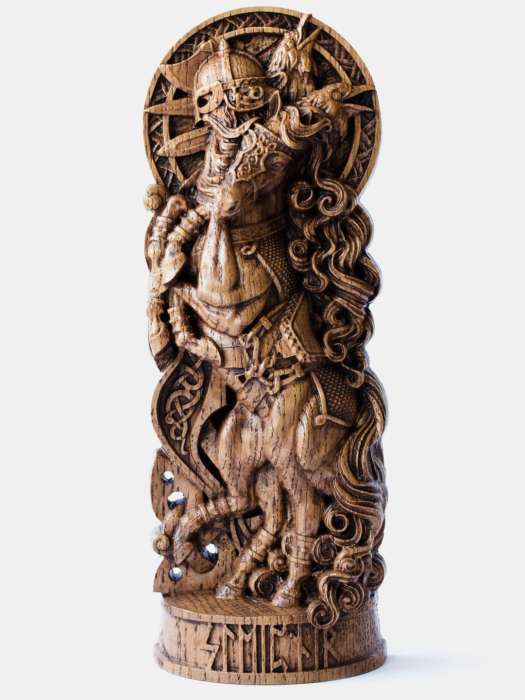 Close-up of the handcrafted oak Sleipnir statue, showcasing Odin's eight-legged horse rearing in detailed armor with a portrait of Odin the warrior and ravens in the background.