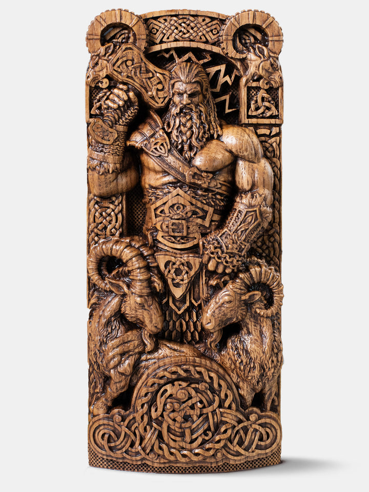 Handcrafted wooden Thor statue, full-figure, with lightning Mjolnir, magical gear, two goats, and goat skull columns