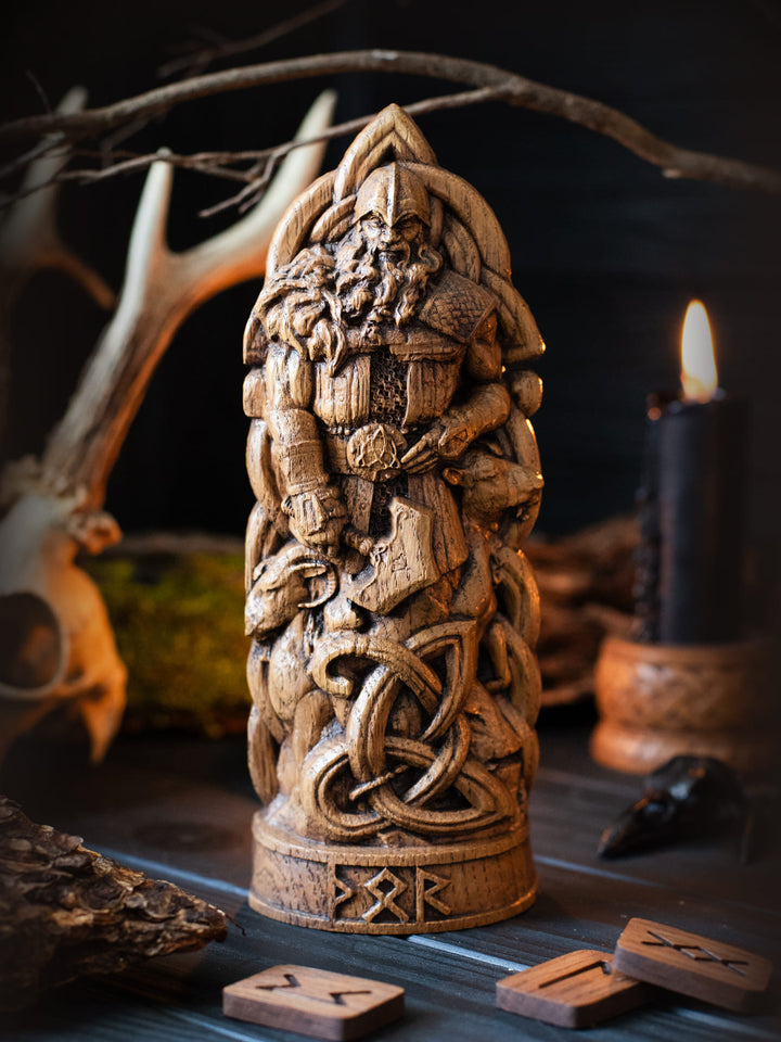 Full view of the Thor statue from the front, highlighting its dimensions and intricate design with his goats, Tanngrisnir and Tanngnjóstr, beside him.