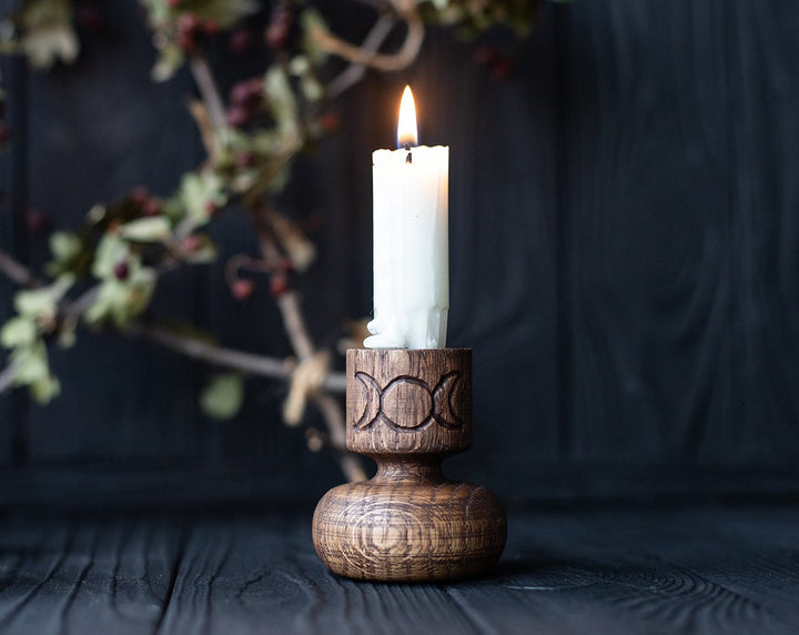 Candle holder with a triple moon, candlestick