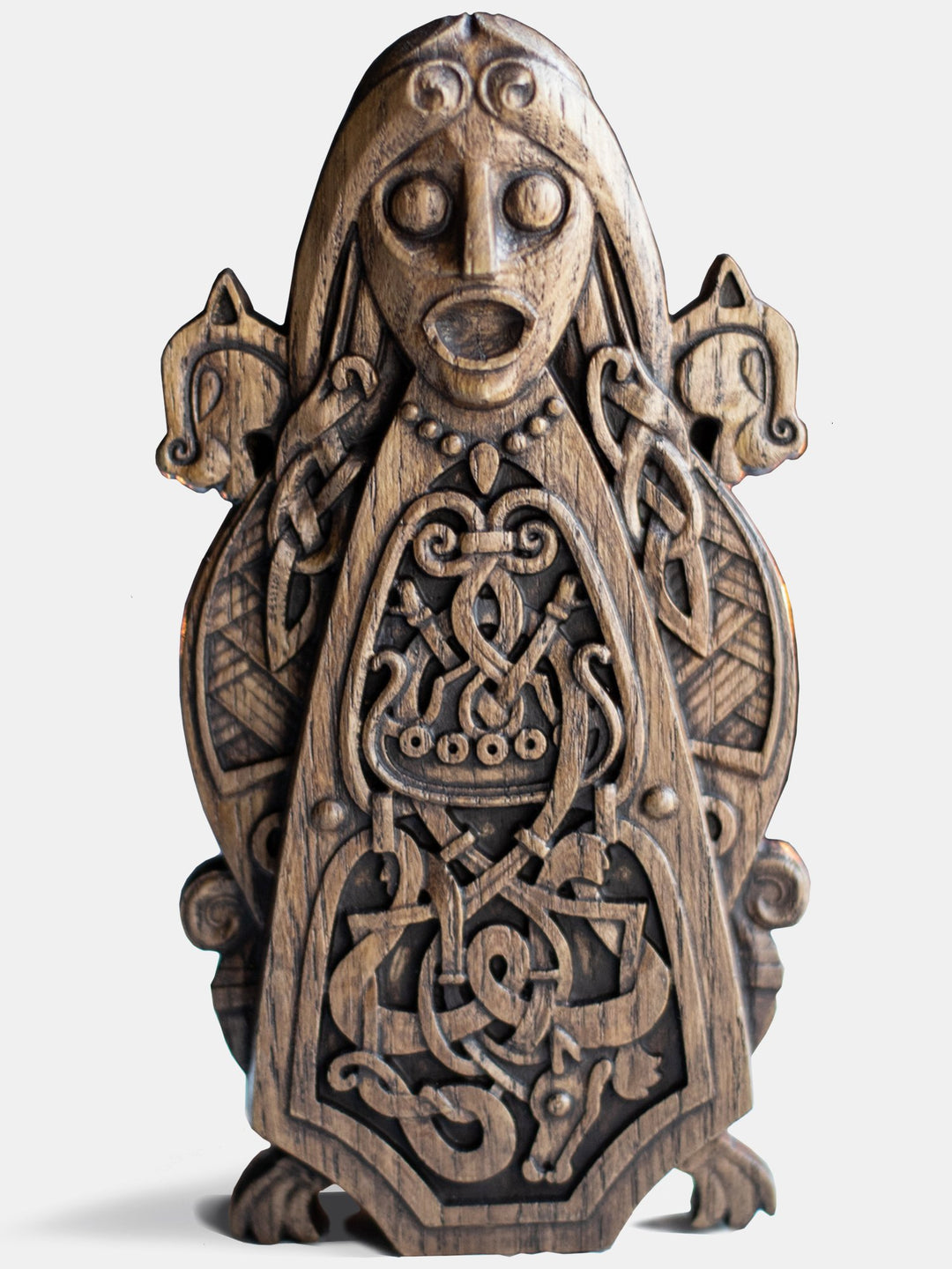 Close-up of the handcrafted oak Freya statue, showcasing Scandinavian decorative patterns and Freya with her two cats.